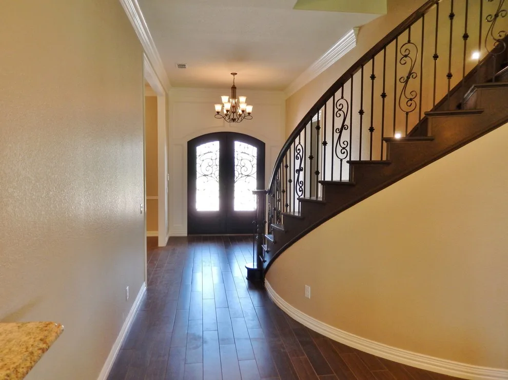 Trim, Staircase, Pantry, and Additional Features by Harmon & Holcomb Homes - Photo 7