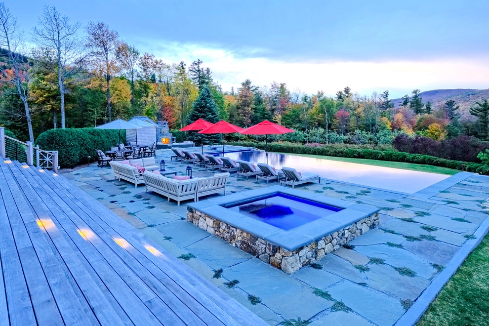 Vanishing Edge Pool with Bluestone Patio & Outdoor Fireplace by Pellettieri Associates, Inc. - Photo 3