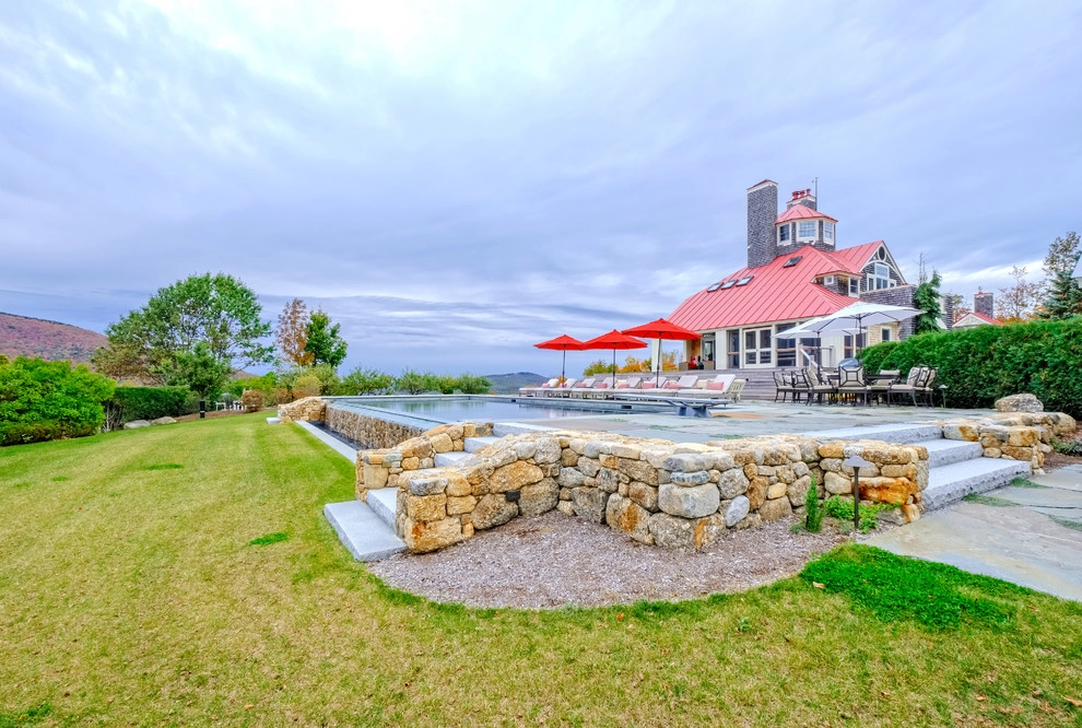Vanishing Edge Pool with Bluestone Patio & Outdoor Fireplace by Pellettieri Associates, Inc. - Photo 2