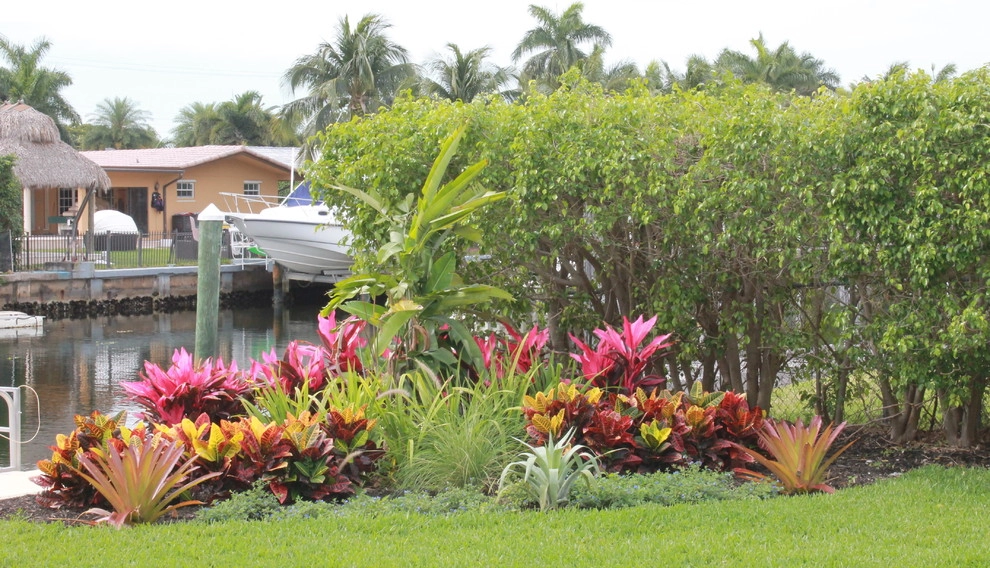 Back Yard Canal by Pink And Green Lawn Care And Landscape - Photo 4
