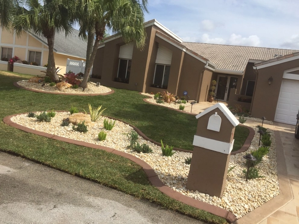 Tamarac Front yard Redesign by Pink And Green Lawn Care And Landscape - Photo 4