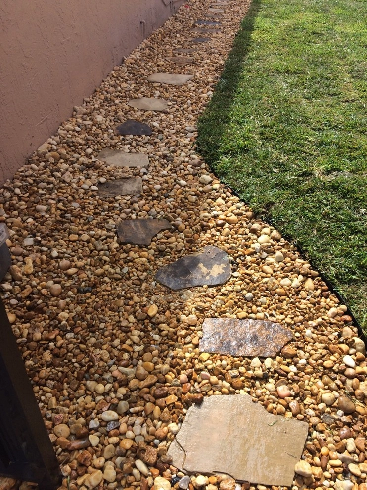 Hialeah side yard by Pink And Green Lawn Care And Landscape - Photo 3