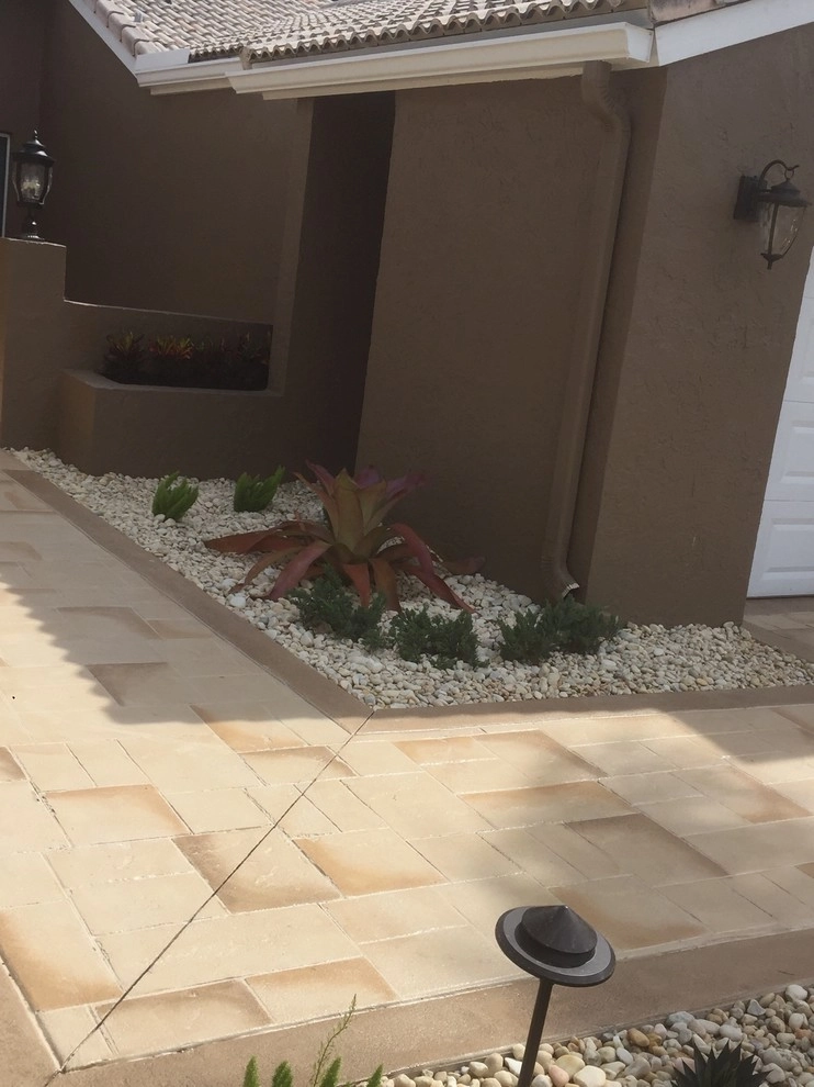 Tamarac Front yard Redesign by Pink And Green Lawn Care And Landscape - Photo 2