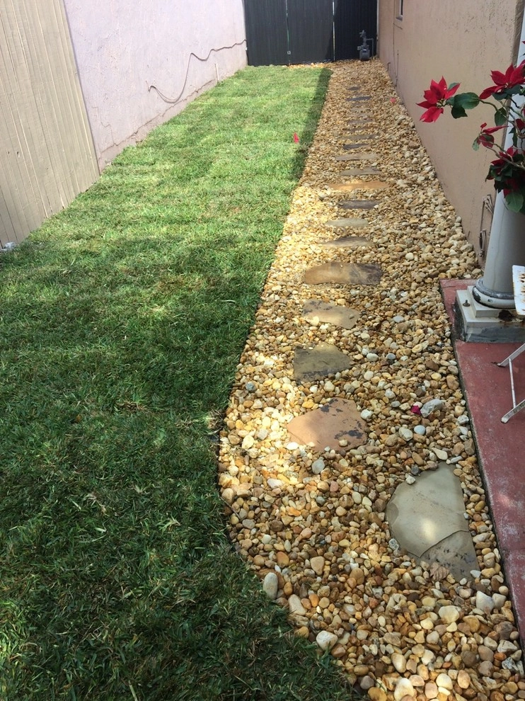 Hialeah side yard by Pink And Green Lawn Care And Landscape - Photo 5