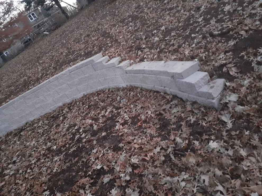 Constructed a segmental block retaining wall by Diamond Design & Build LLC - Photo 4