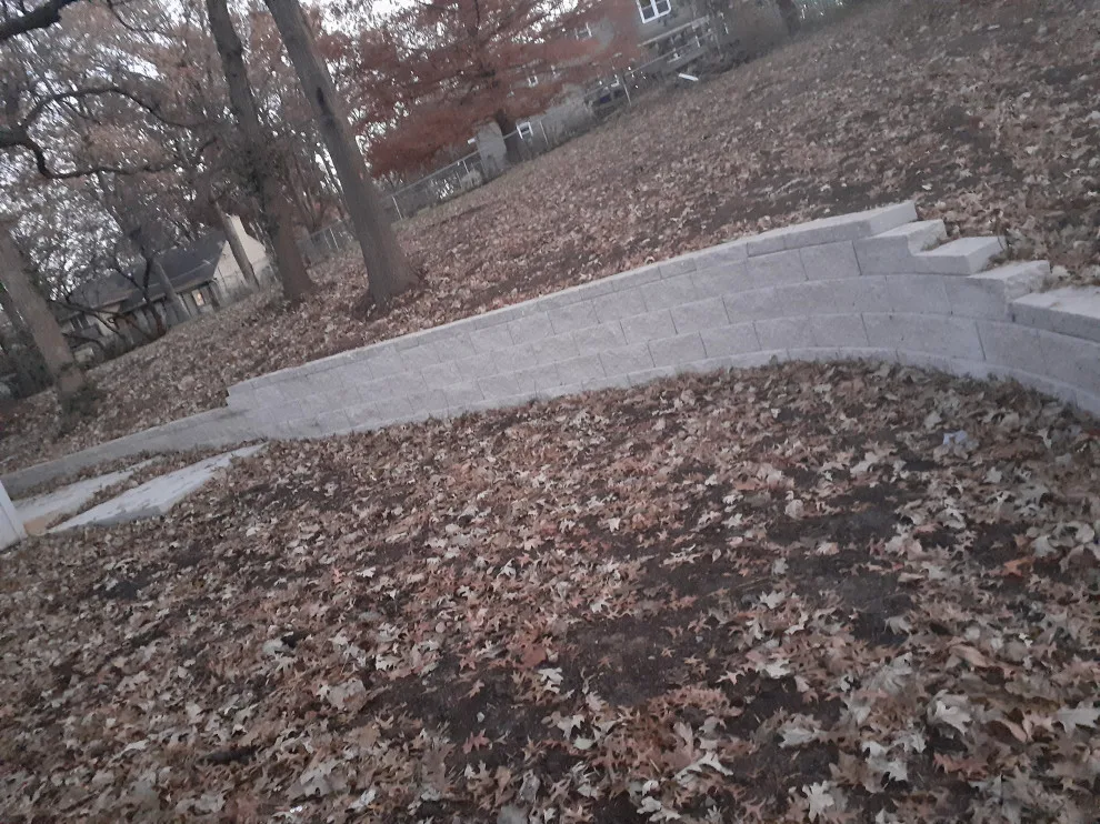 Constructed a segmental block retaining wall by Diamond Design & Build LLC - Photo 6