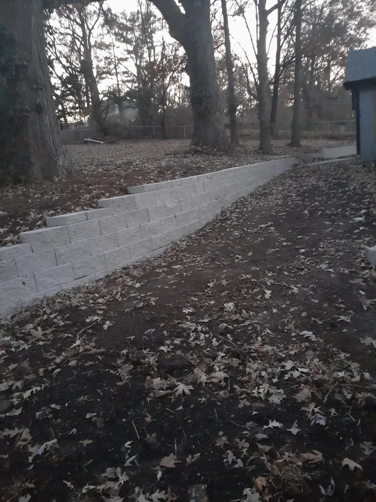 Constructed a segmental block retaining wall by Diamond Design & Build LLC - Photo 5