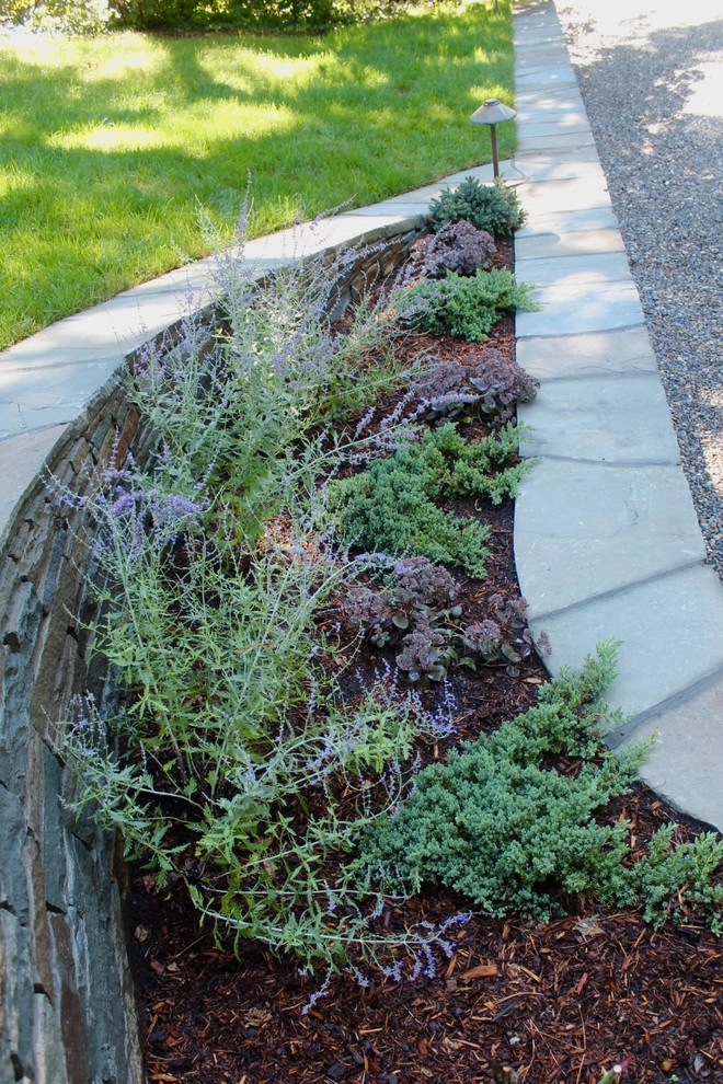 Wellfleet home by Ponderosa Landscaping & Stonework - Photo 33
