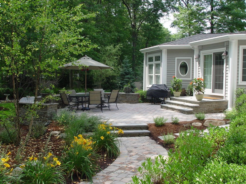 Cozy Patio and Seatwall by Artisan Landscapes And Pools - Photo 2