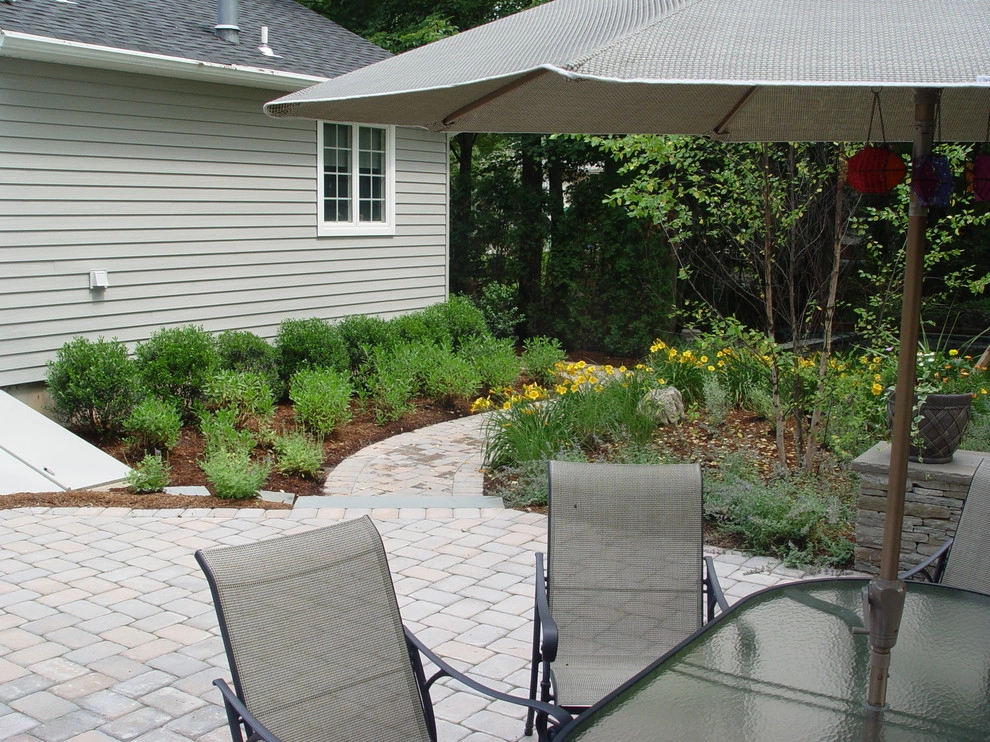Cozy Patio and Seatwall by Artisan Landscapes And Pools - Photo 10