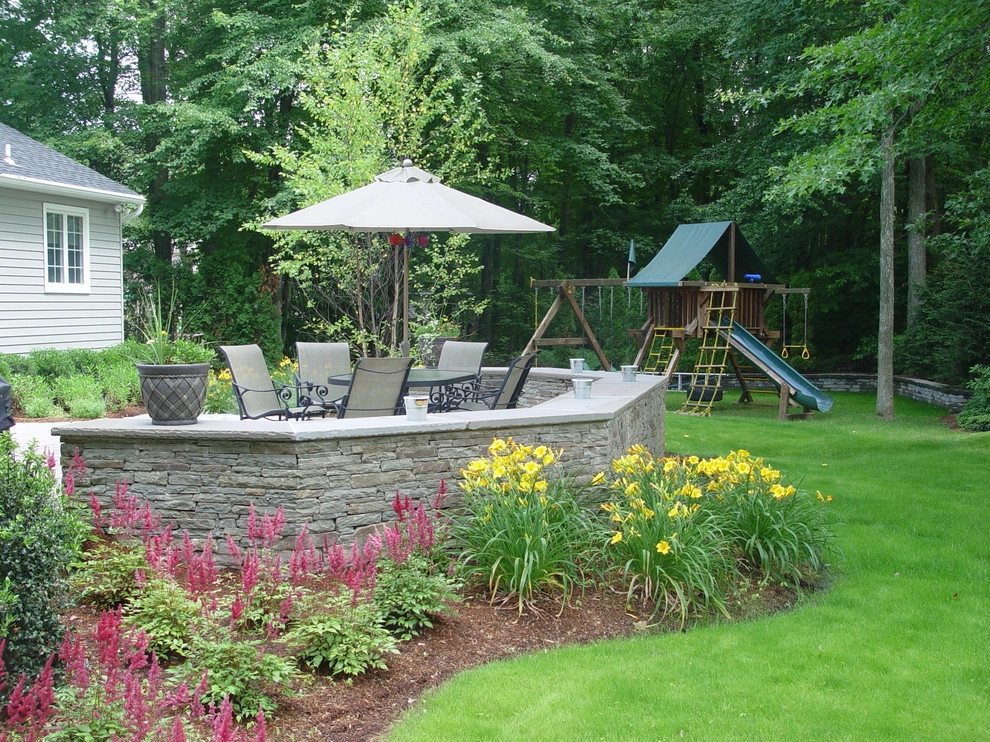 Cozy Patio and Seatwall by Artisan Landscapes And Pools - Photo 8