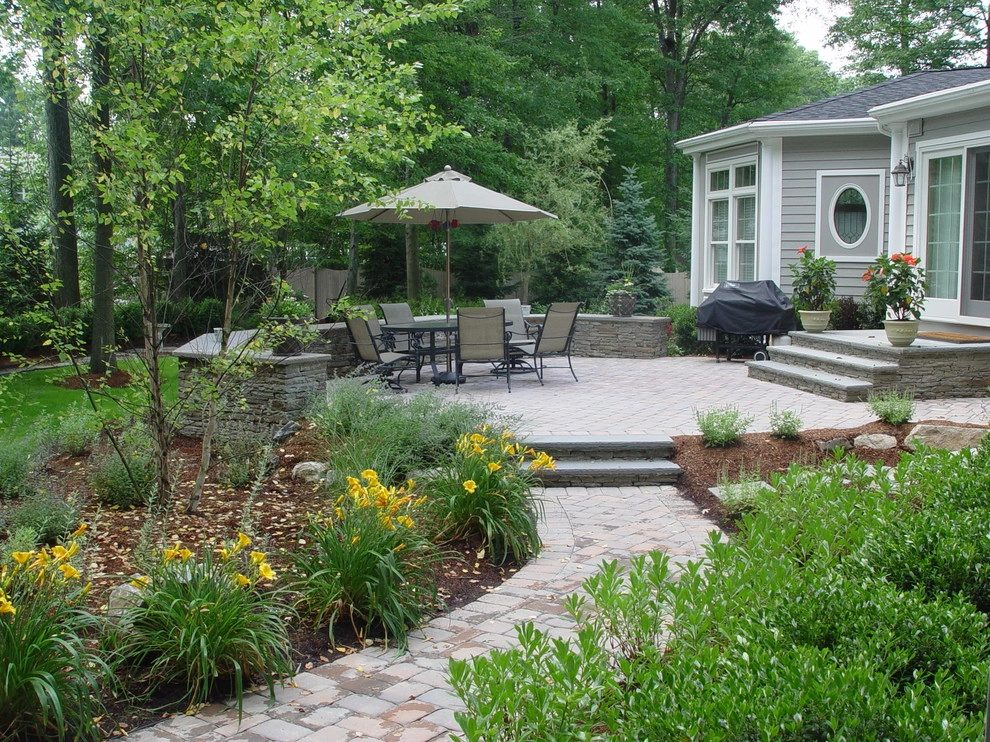 Cozy Patio and Seatwall by Artisan Landscapes And Pools - Photo 9