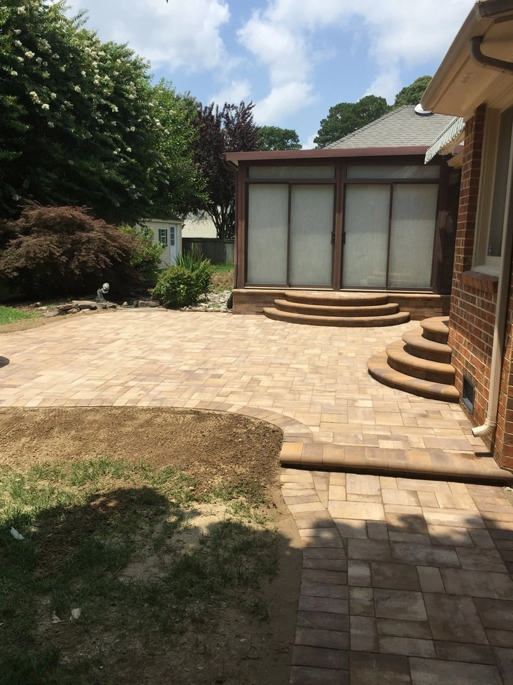 Curved Steps and Firepit by Premiere Landscape Design - Photo 5