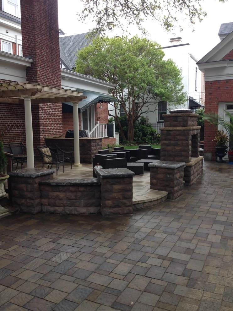 Custom Fireplace and Raised Patio by Premiere Landscape Design - Photo 5