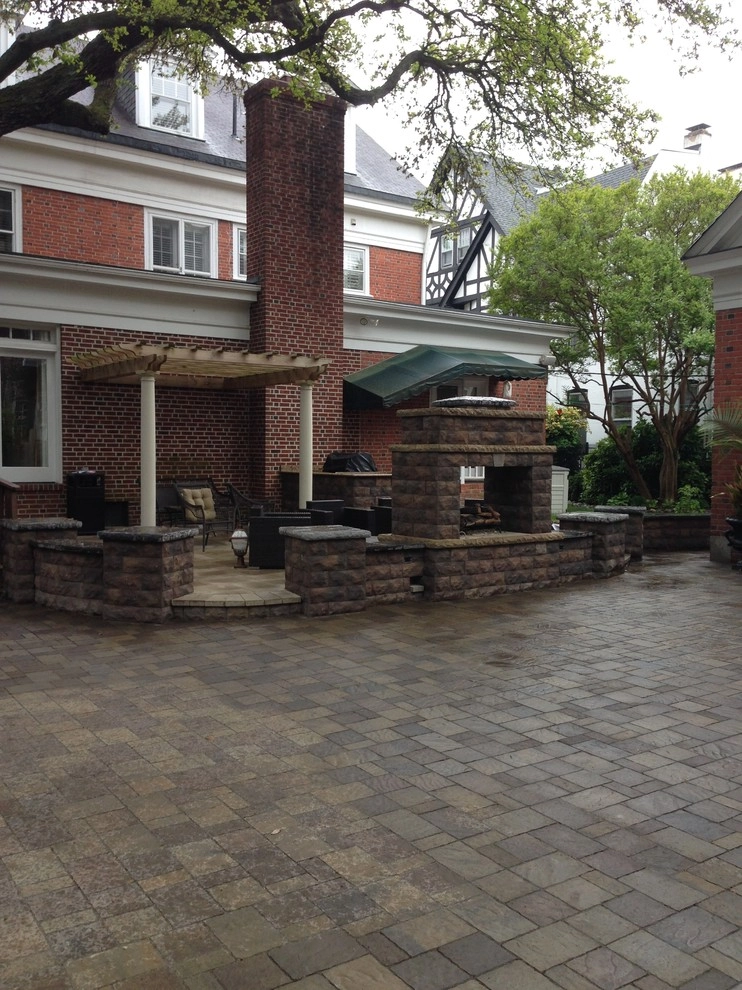 Custom Fireplace and Raised Patio by Premiere Landscape Design - Photo 2