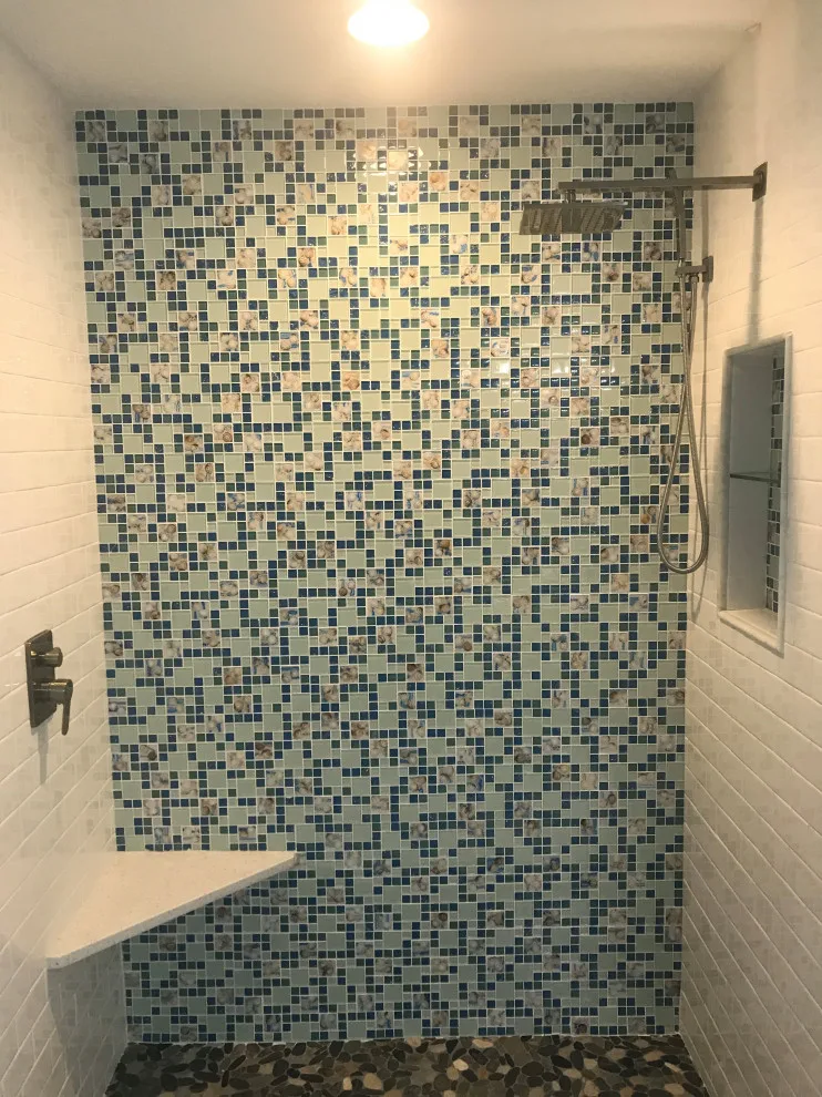 Distinctive seashell mosaic shower for an upscale coastal home by All Over IT Renovations - Photo 4
