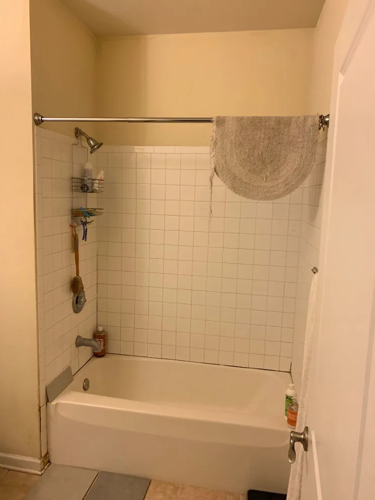 Compact bathroom featuring a walk-in shower by All Over IT Renovations - Photo 2
