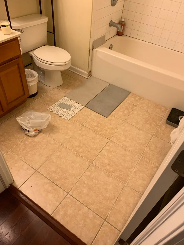 Compact bathroom featuring a walk-in shower by All Over IT Renovations - Photo 3