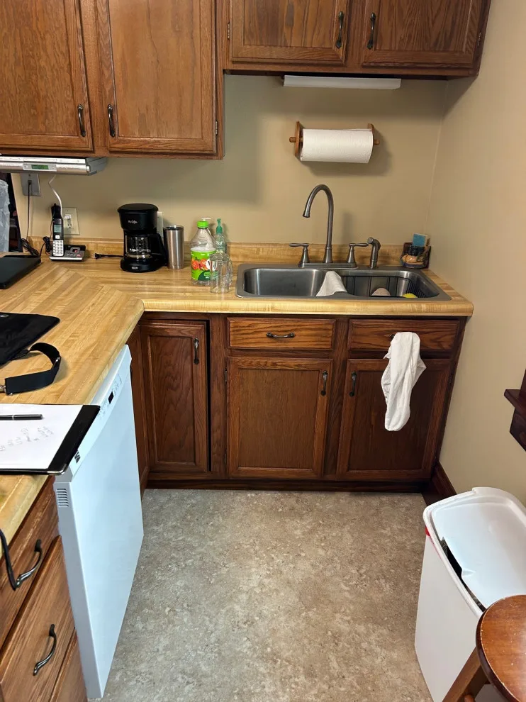 Kitchen Renovation Featuring New Morning Dew Colored Cabinets by Kitchen Solvers Of Eau Claire - Photo 8