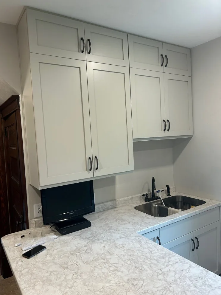 Kitchen Renovation Featuring New Morning Dew Colored Cabinets by Kitchen Solvers Of Eau Claire - Photo 2