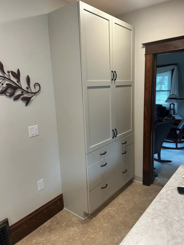 Kitchen Renovation Featuring New Morning Dew Colored Cabinets by Kitchen Solvers Of Eau Claire - Photo 4