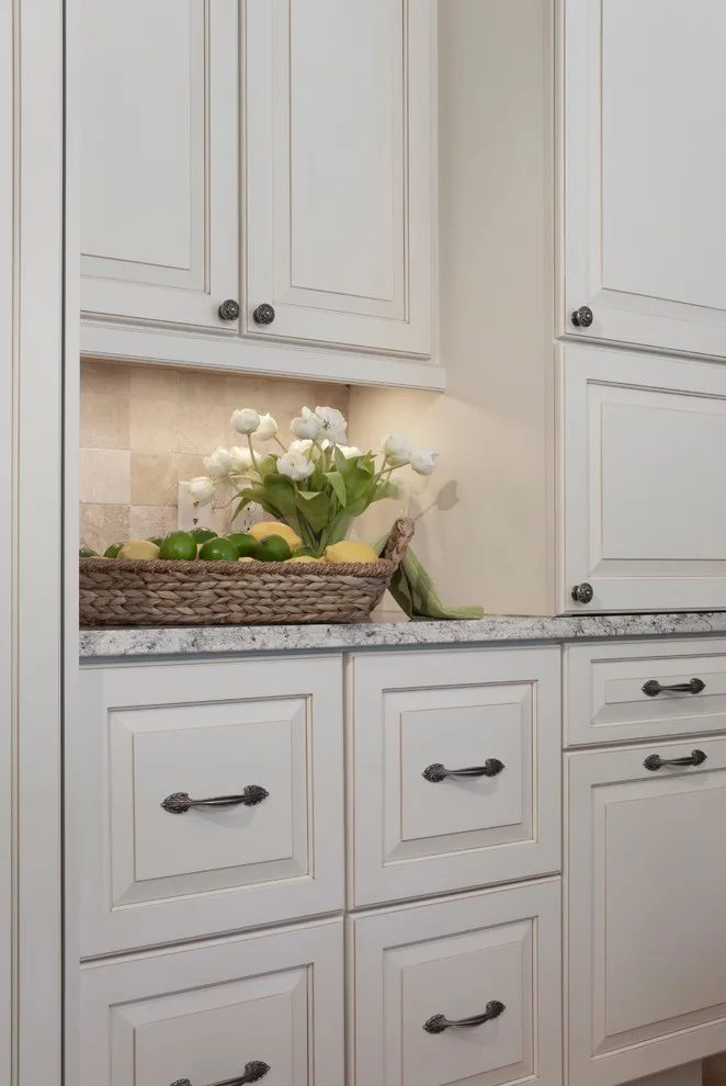 Classic Kitchen with Large Stone Vent Hood by Lorrien Homes & Remodeling - Photo 2