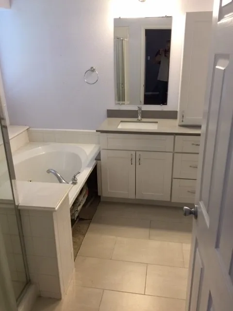 Bathroom Shower Transformation and Storage Optimization by Redoux, LLC. - Photo 26