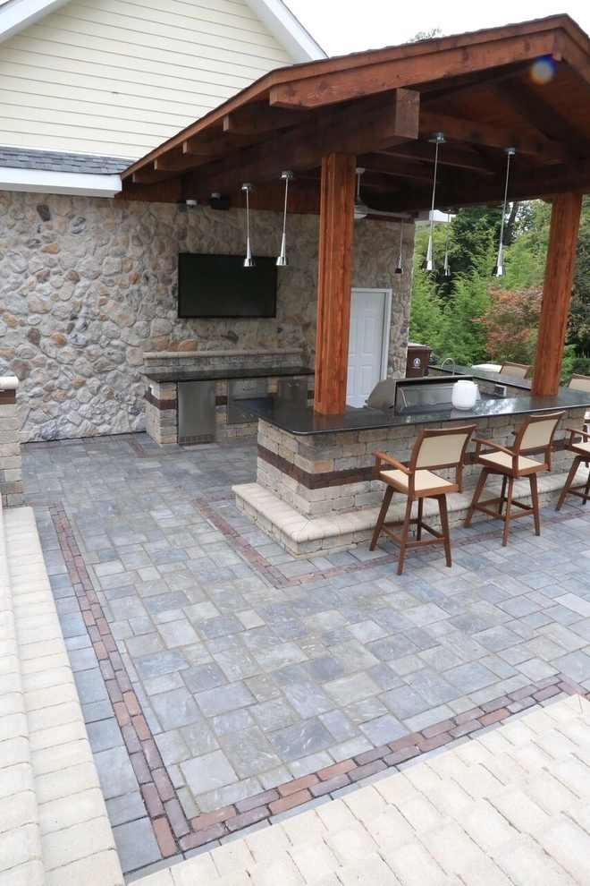 Complete Outdoor Living Space: Kitchen, Firepit, Lounge by Ricci's Landscape Management - Photo 19