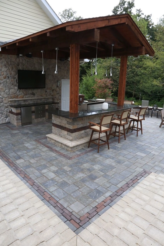 Complete Outdoor Living Space: Kitchen, Firepit, Lounge by Ricci's Landscape Management - Photo 21