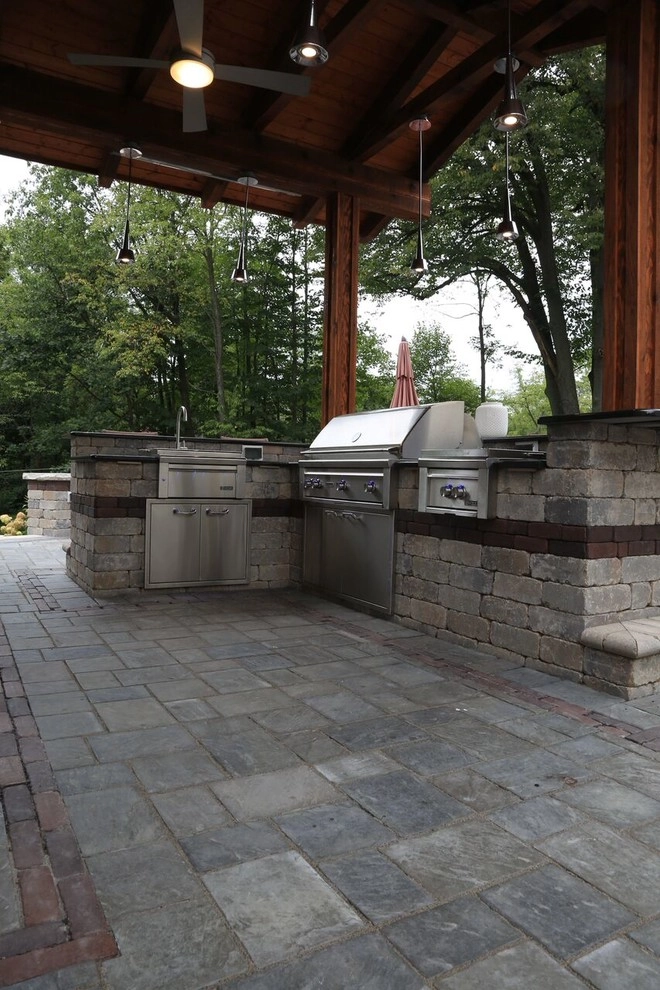 Complete Outdoor Living Space: Kitchen, Firepit, Lounge by Ricci's Landscape Management - Photo 7