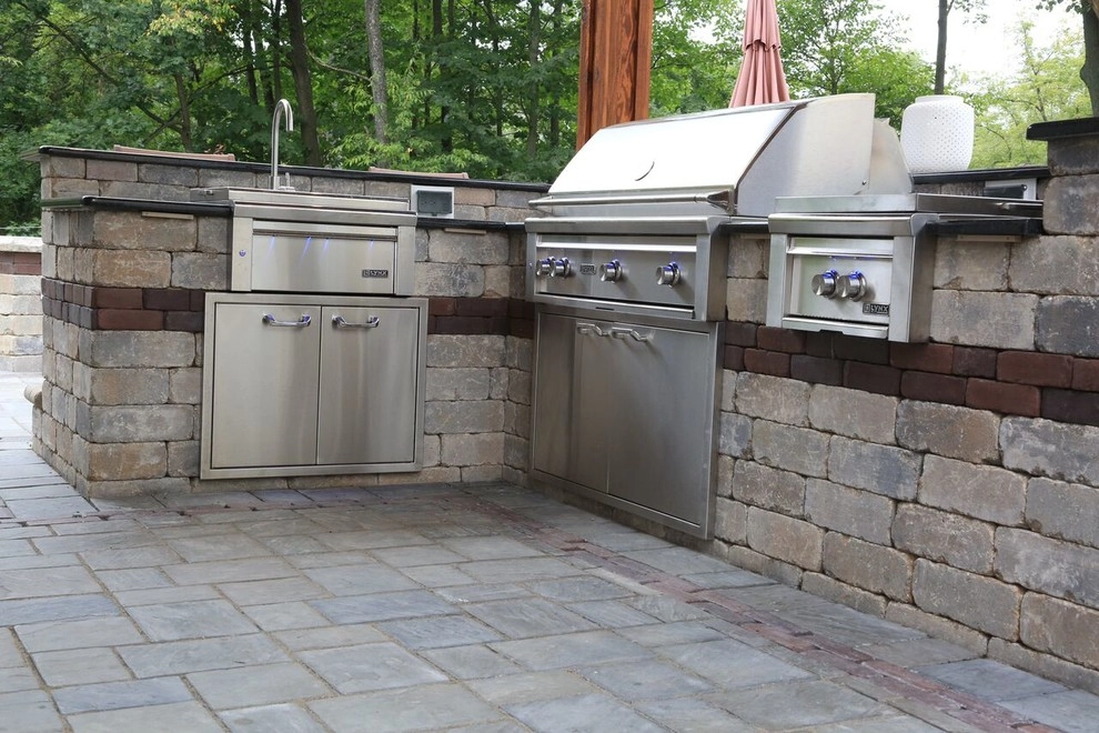 Complete Outdoor Living Space: Kitchen, Firepit, Lounge by Ricci's Landscape Management - Photo 13