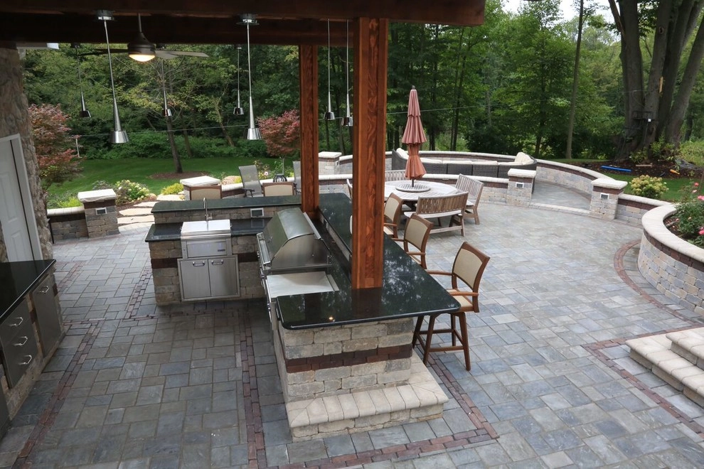 Complete Outdoor Living Space: Kitchen, Firepit, Lounge by Ricci's Landscape Management - Photo 10