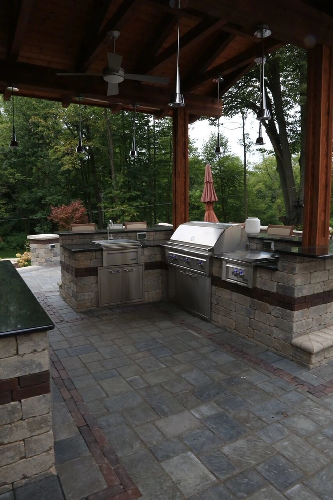 Complete Outdoor Living Space: Kitchen, Firepit, Lounge by Ricci's Landscape Management - Photo 12