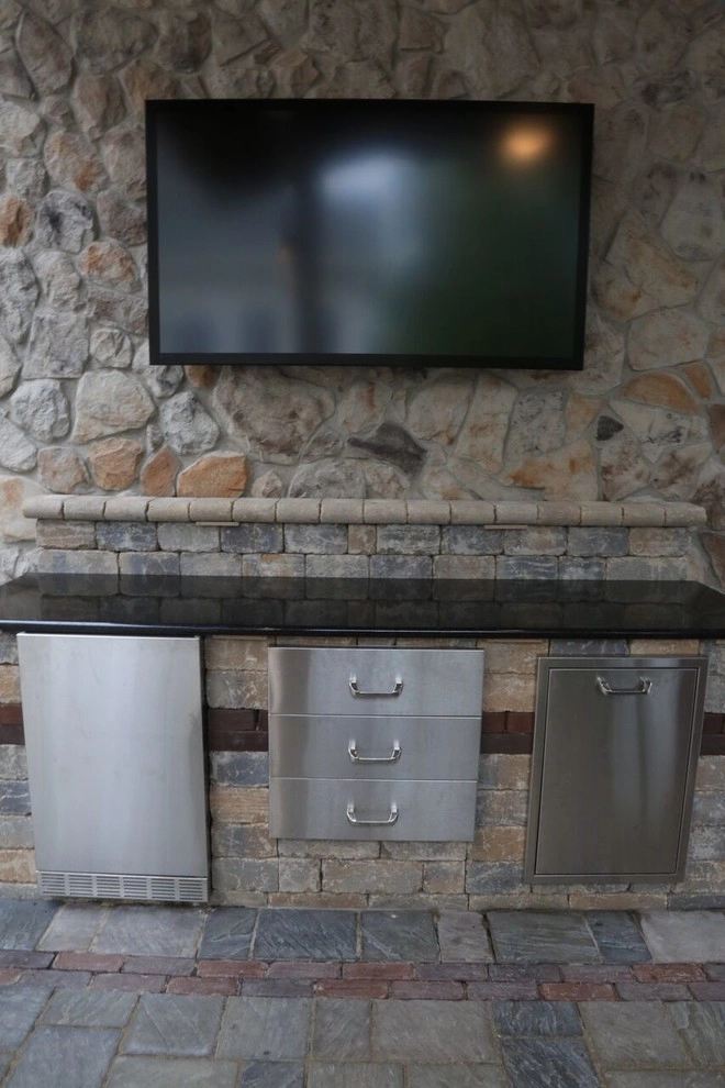 Complete Outdoor Living Space: Kitchen, Firepit, Lounge by Ricci's Landscape Management - Photo 20