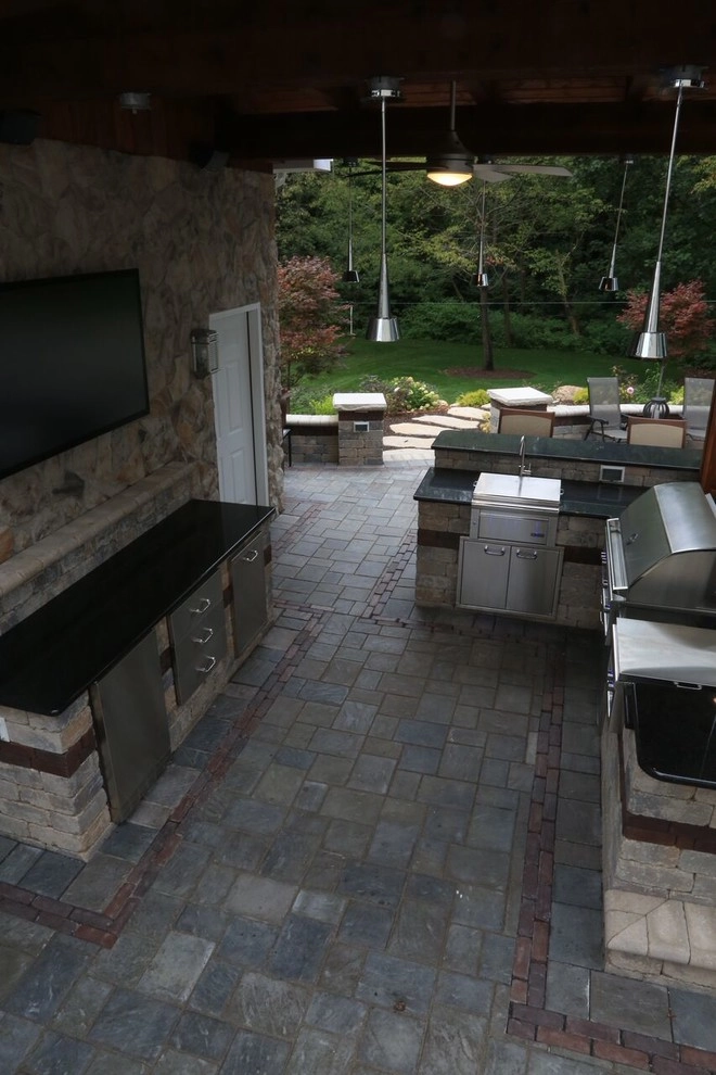 Complete Outdoor Living Space: Kitchen, Firepit, Lounge by Ricci's Landscape Management - Photo 11