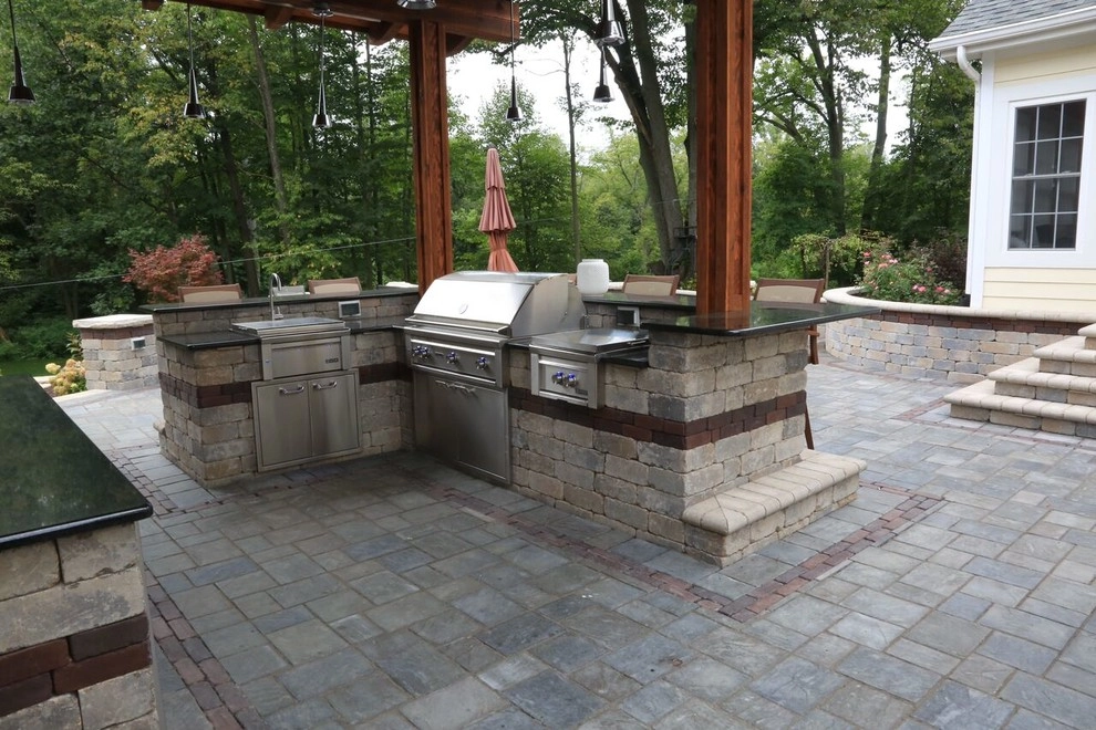 Complete Outdoor Living Space: Kitchen, Firepit, Lounge by Ricci's Landscape Management - Photo 18