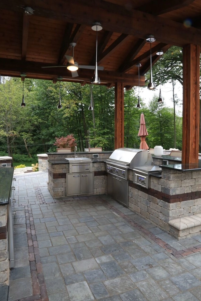 Complete Outdoor Living Space: Kitchen, Firepit, Lounge by Ricci's Landscape Management - Photo 9