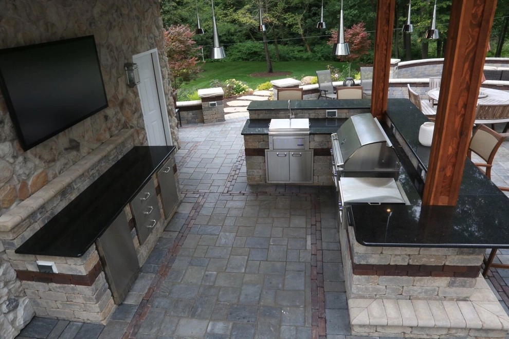 Complete Outdoor Living Space: Kitchen, Firepit, Lounge by Ricci's Landscape Management - Photo 6