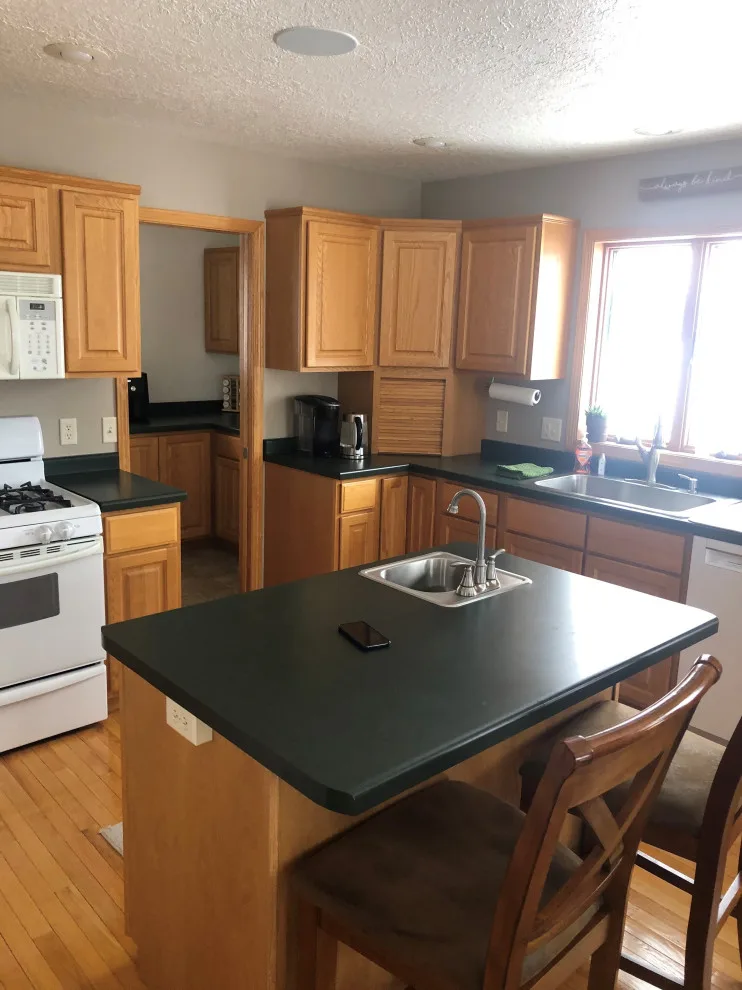 Contemporary Kitchen Renovation Through Cabinet Refacing by Kitchen Solvers Of Eau Claire - Photo 4