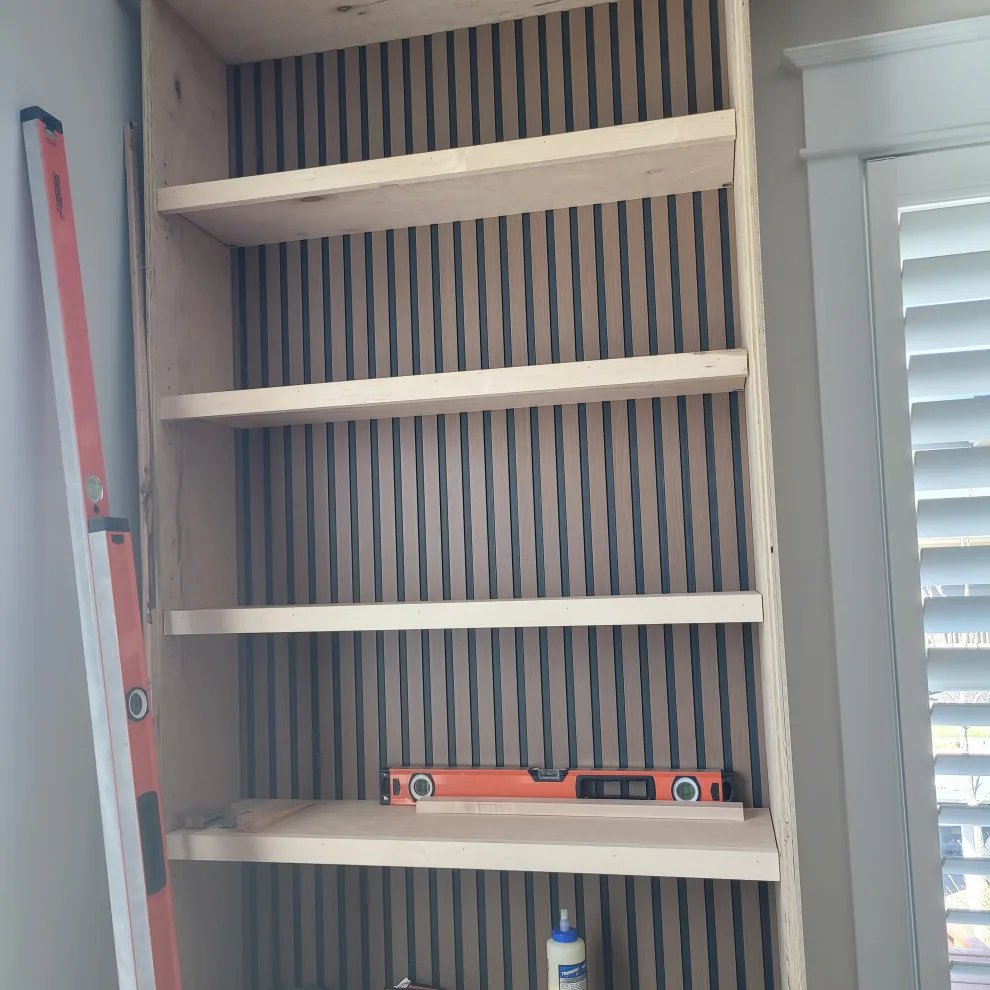 Bespoke Bookcases with Integrated Window Bench and Storage by KBL Remodeling - Photo 8