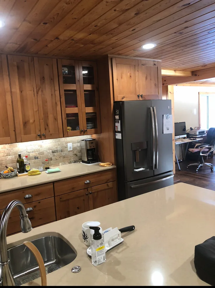 Knotty Alder Rustic Kitchen Renovation by Kitchen Solvers Of Eau Claire - Photo 6