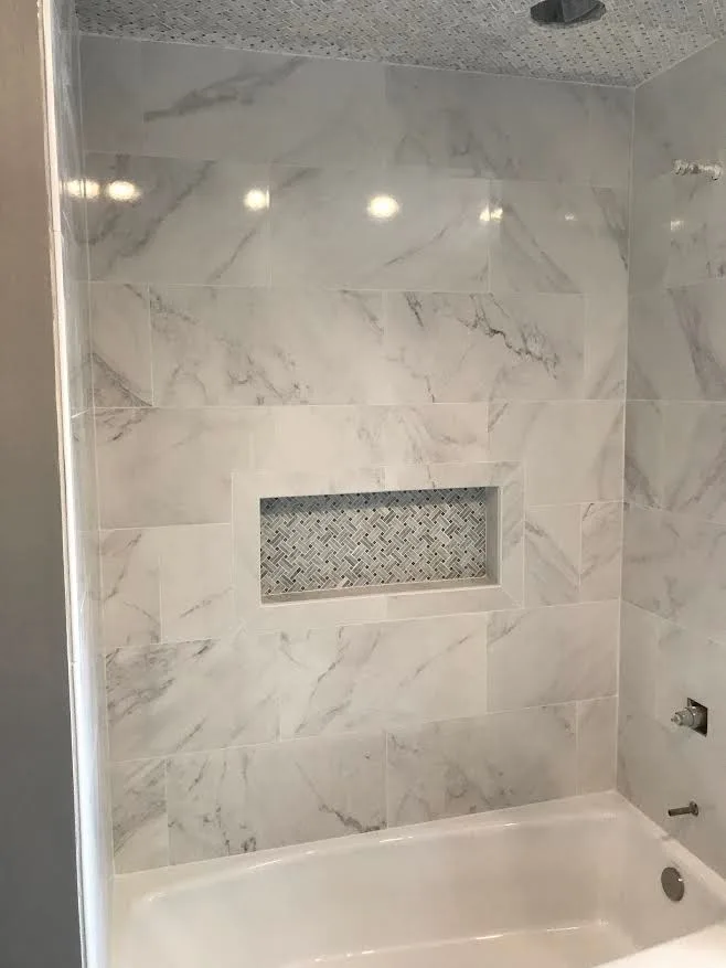 Marble Tile Shower Project by Northshore Renovations - Photo 8