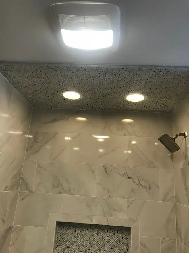 Marble Tile Shower Project by Northshore Renovations - Photo 7