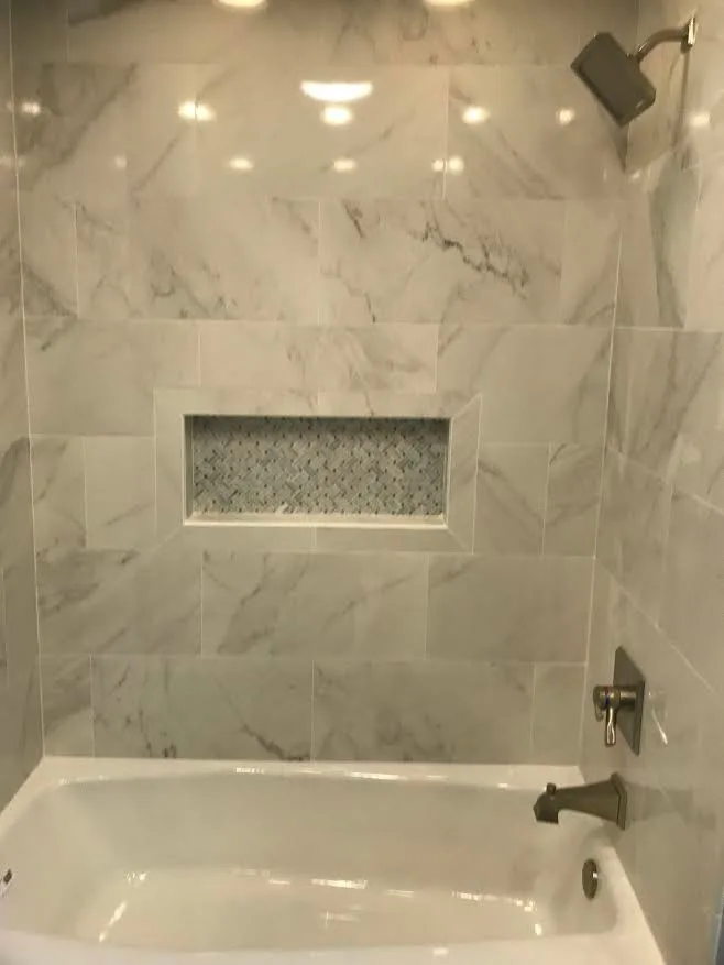 Marble Tile Shower Project by Northshore Renovations - Photo 4