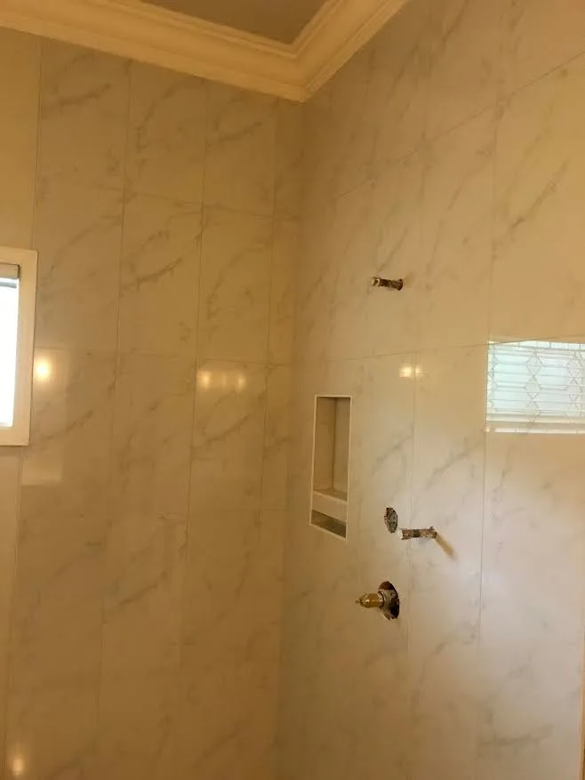 Marble Tile Shower Project by Northshore Renovations - Photo 2