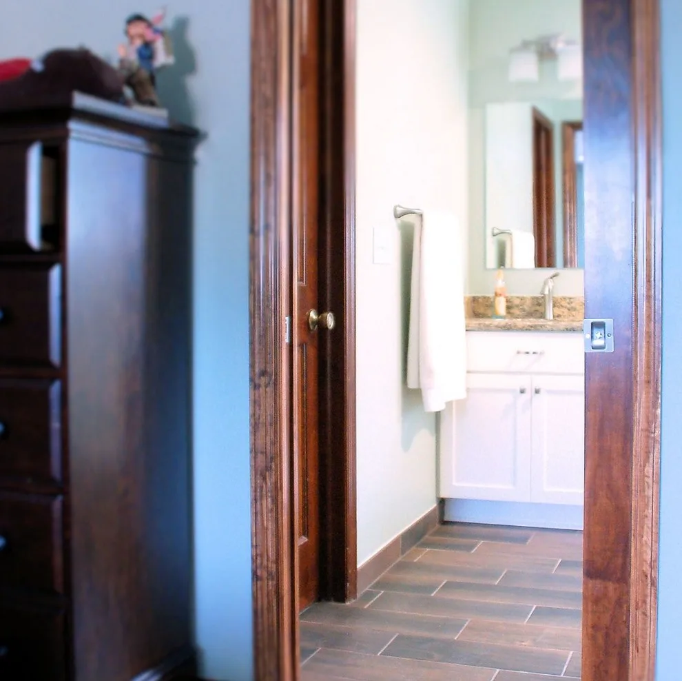 Stylish Country Bathroom Featuring Spacious Shower by Bathroom And Kitchen Services, LLC - Photo 2
