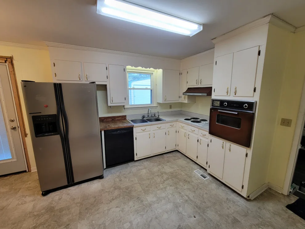 Impressive Kitchen Renovation Featuring New Cabinets by Kitchen Solvers Of Spring Hill - Photo 10