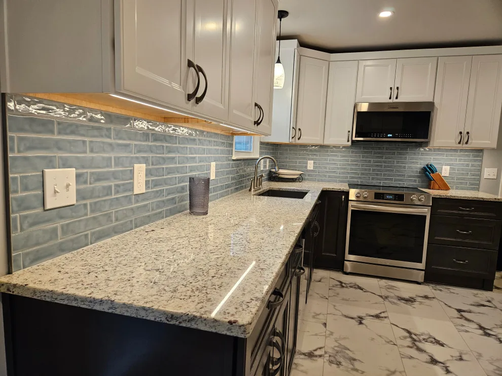 Impressive Kitchen Renovation Featuring New Cabinets by Kitchen Solvers Of Spring Hill - Photo 11
