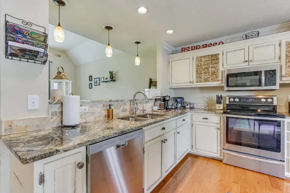 Remarkable Kitchen Makeover Featuring New Cabinets by Kitchen Solvers Of Spring Hill - Photo 11