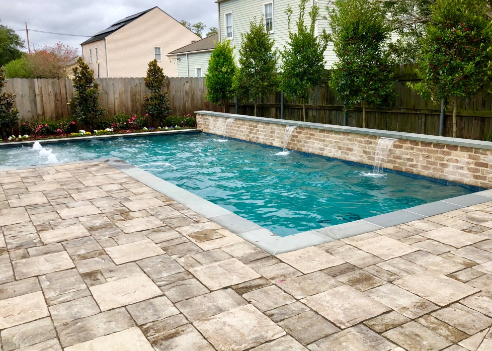 L-Shaped Pool with Stone Deck by Artscape Land Design - Photo 3